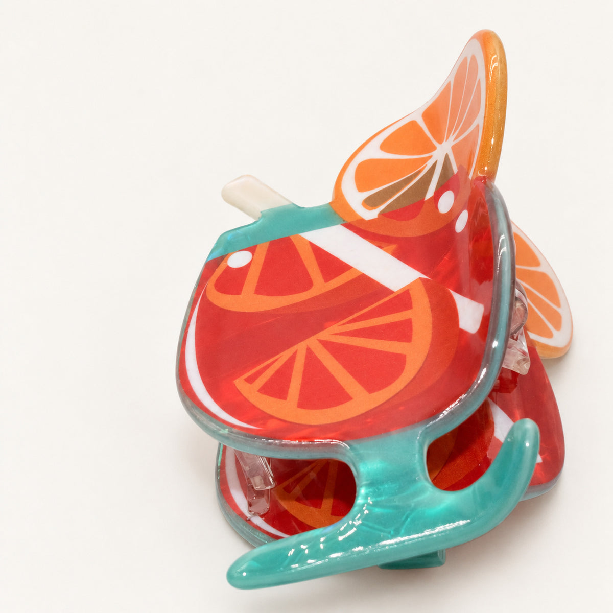 Haarklammer – Aperol Spritz – Ansicht 2 · freigestellt auf neutralem Hintergrund
